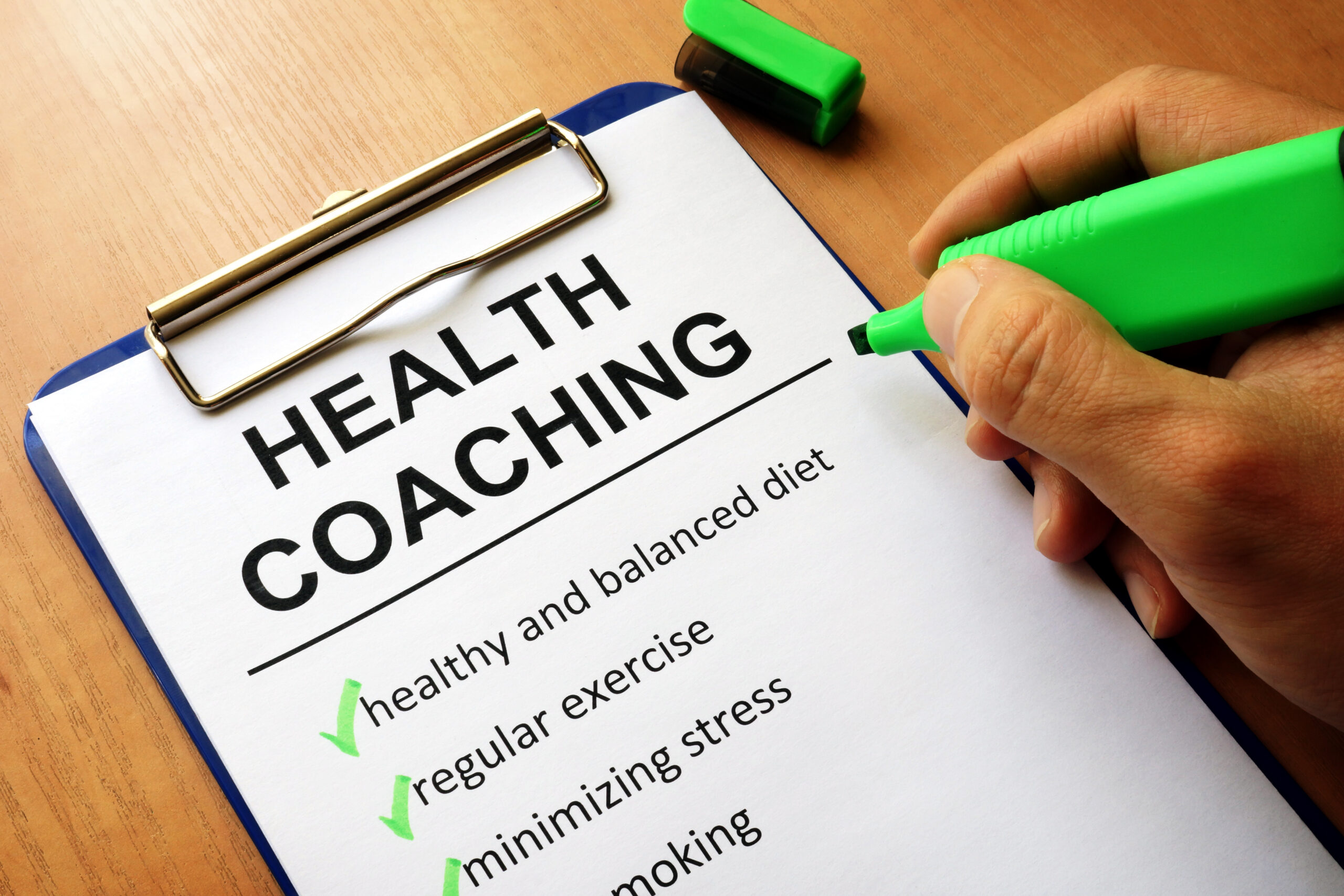 Clipboard with health coaching list. Healthy living concept.